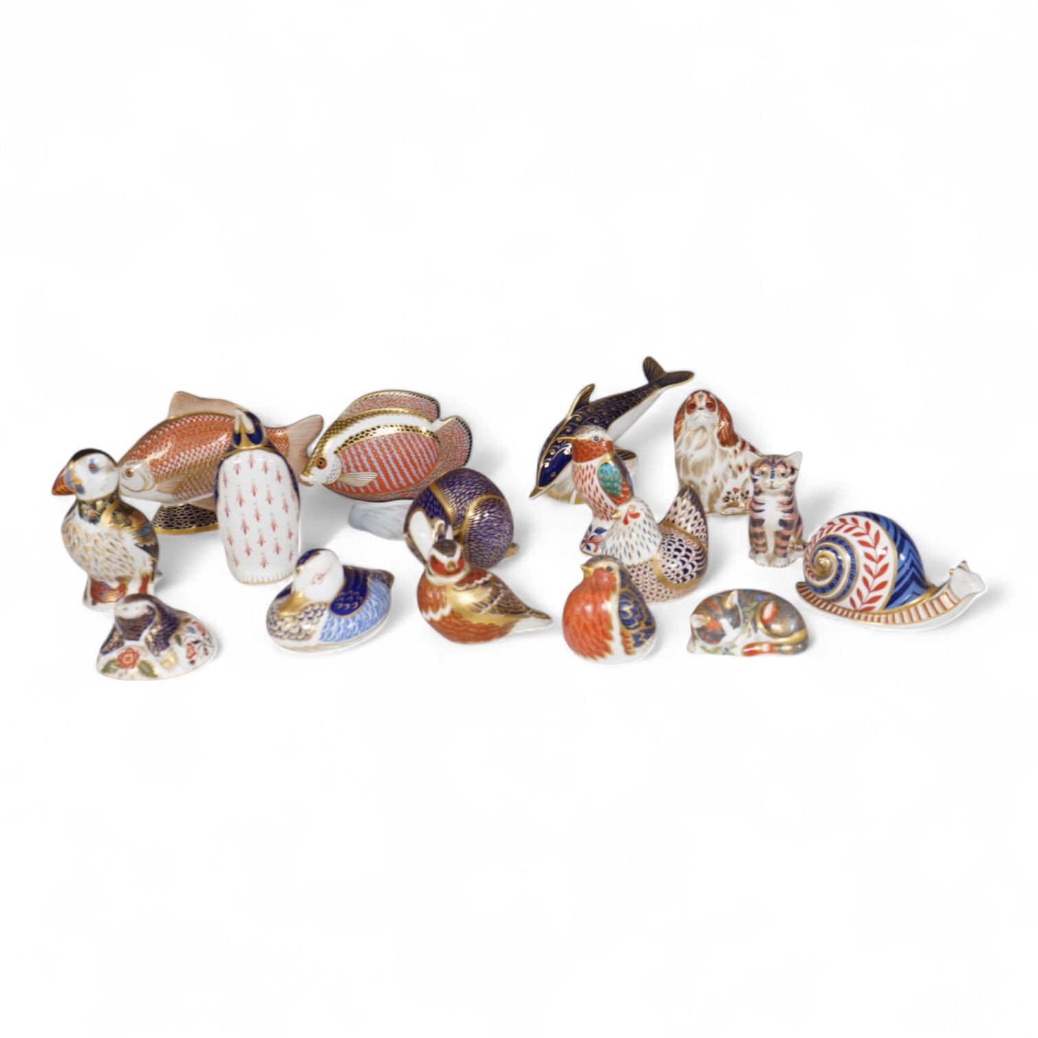 A collection of Royal Crown Derby Imari animal paperweights to include cats, fish and birds, largest 14cm high